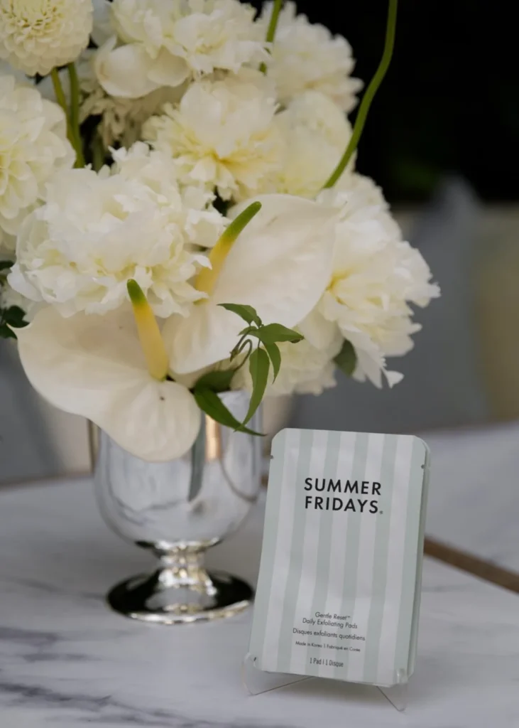 Summer Fridays event display with white flowers